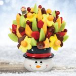 arrangement in snowman vase
